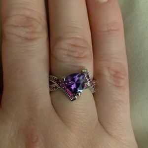 Purple trillion cut crossover ring